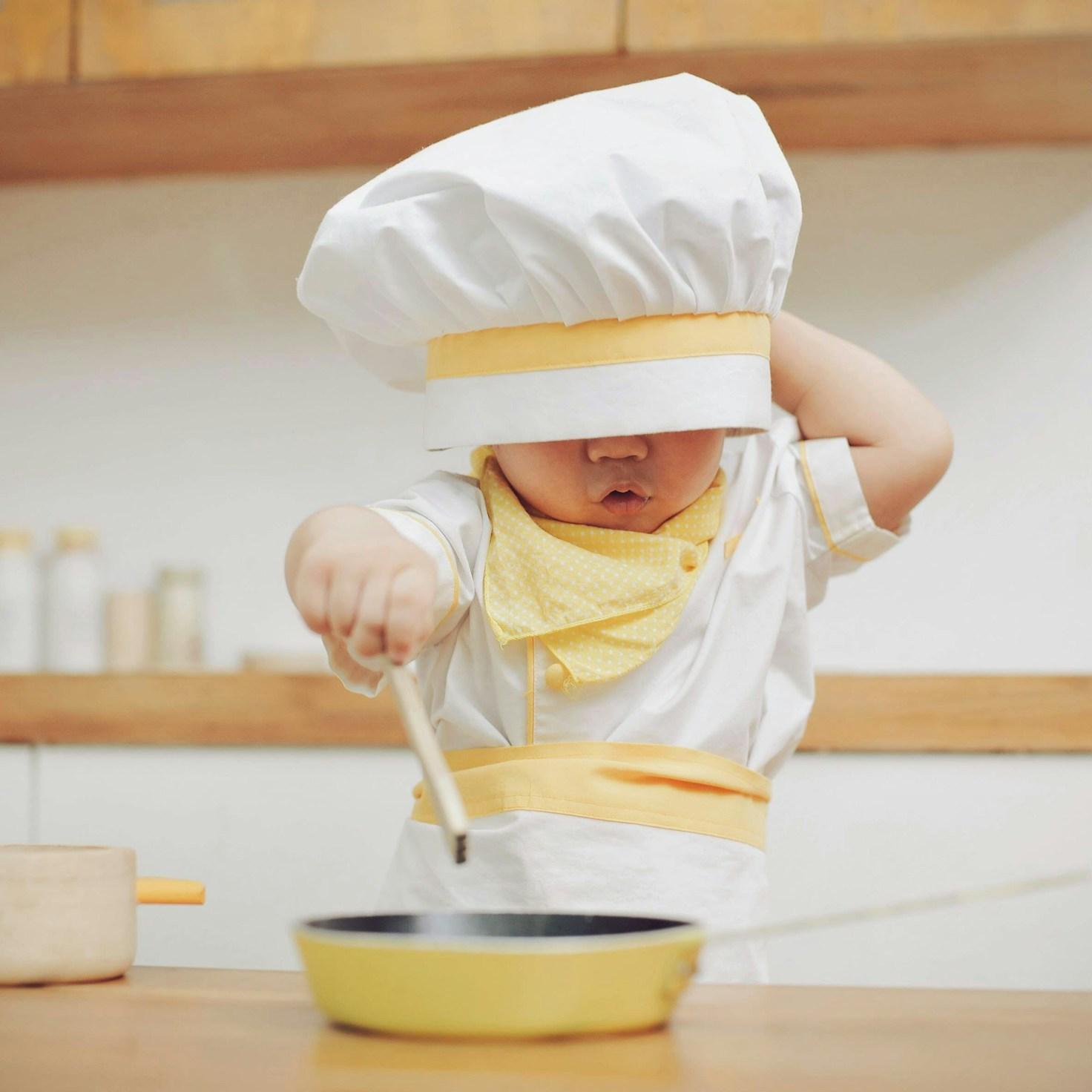 Community members working together in a contemporary kitchen, swapping recipes and techniques